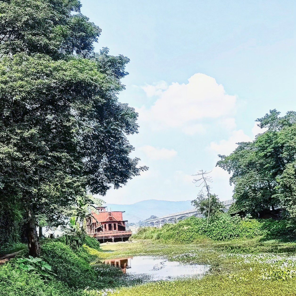 📷 Red Roof, Still Water — Northeast India · 03 Aug 2026