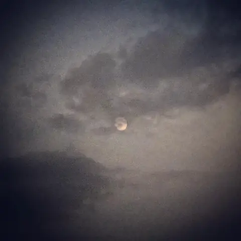 Moon Through Cloud, India