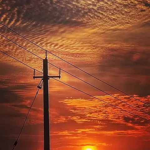 Wires at Sunset, India